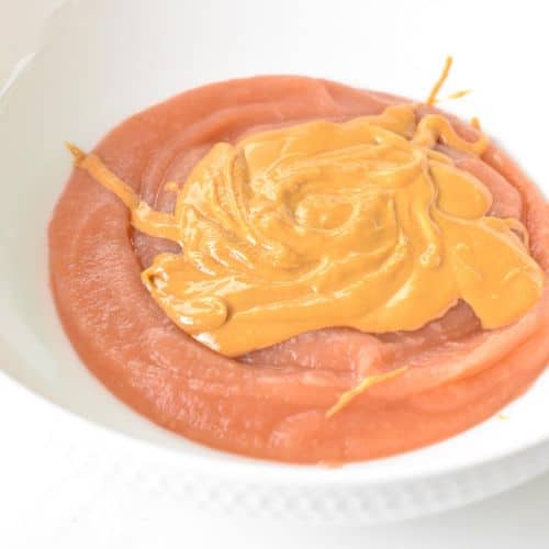 Peanut butter and applesauce in a large bowl.