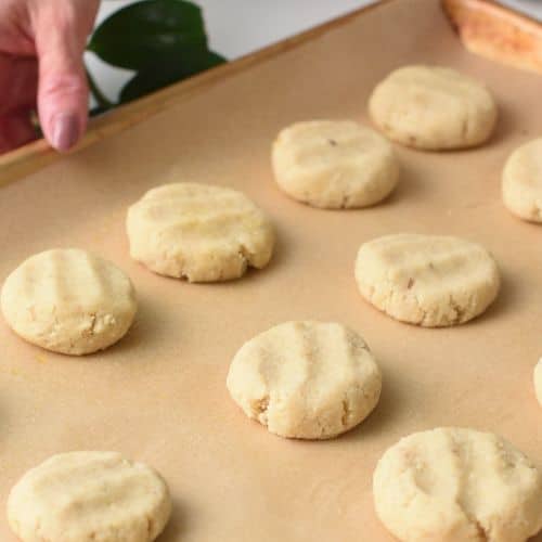 Taking the almond flour banana cookies to the oven.