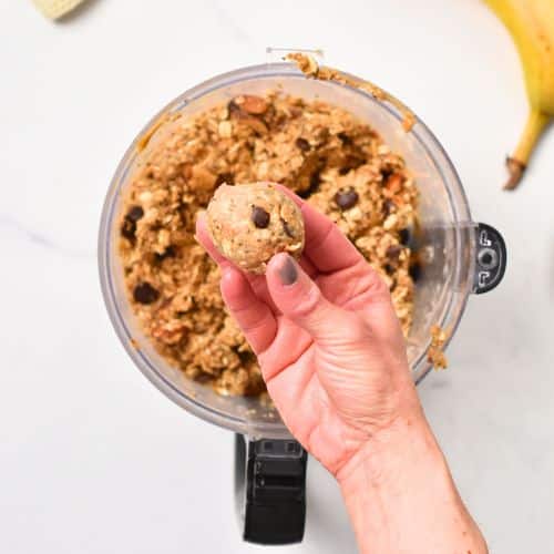 Rolling Banana Protein Balls above a food processor