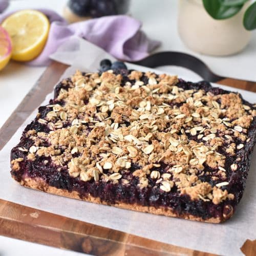 Blueberry Breakfast Bars on a chopping board.