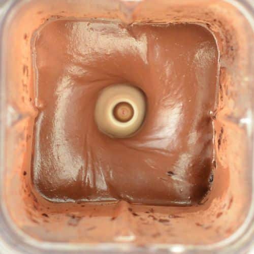 Blending the chocolate avocado mousse in a blender.