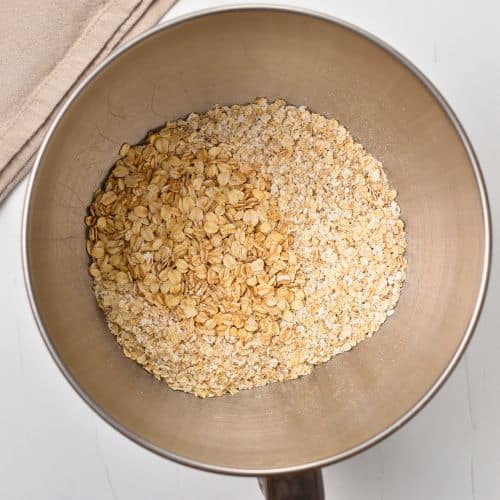 Dry Peanut Butter Oatmeal Bar ingredients in a mixing bowl.