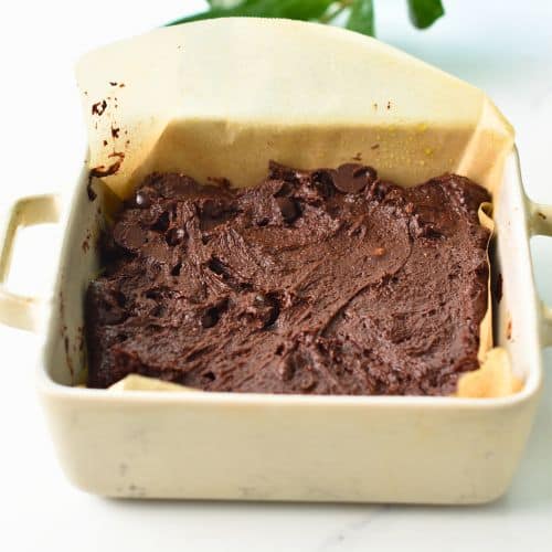 Healthy brownie batter in a ceramic pan.