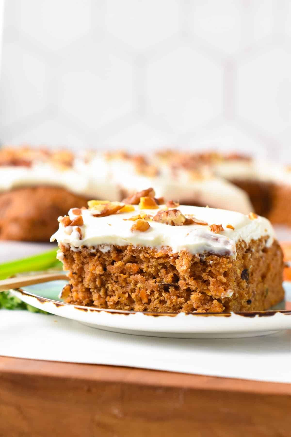 Slice of decorated Vegan Carrot Cake