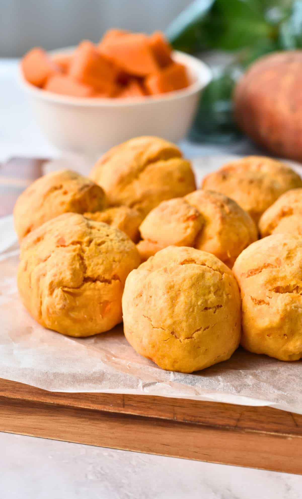 2-Ingredient Sweet Potato Rolls on a chopping board.