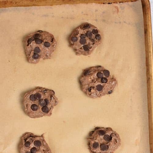 Banana Protein Cookies formed on a cookie sheet.