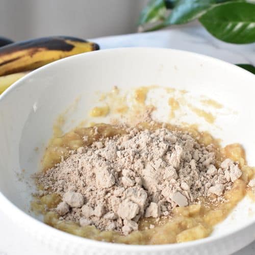 Banana Protein Cookies ingredients in a mixing bowl.