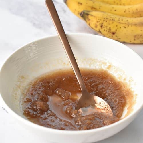 banana monkey bread coating in a bowl.