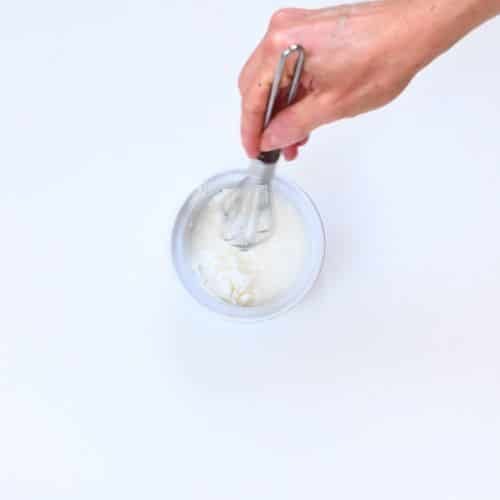 Making a slurry with a whisk in a small ramekin.