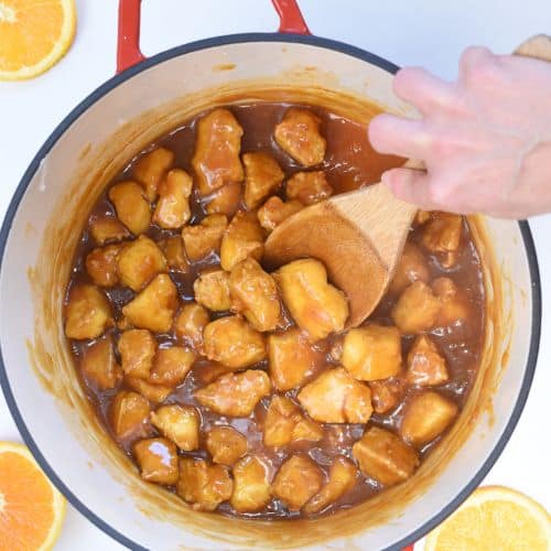Stirring orange tofu.