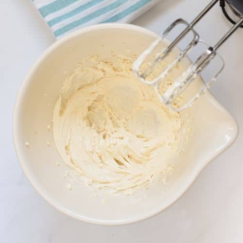 Vegan butter beaten in a mixing bowl.