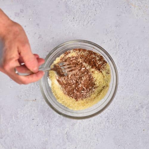 Dry Vegan Gluten-Free Mug Cake ingredients in a  bowl.