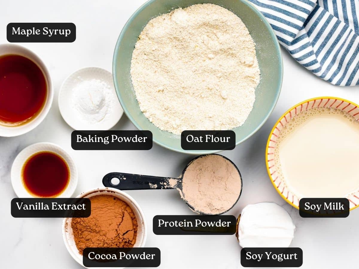 Ingredients for Protein Cake in bowls and ramekins.
