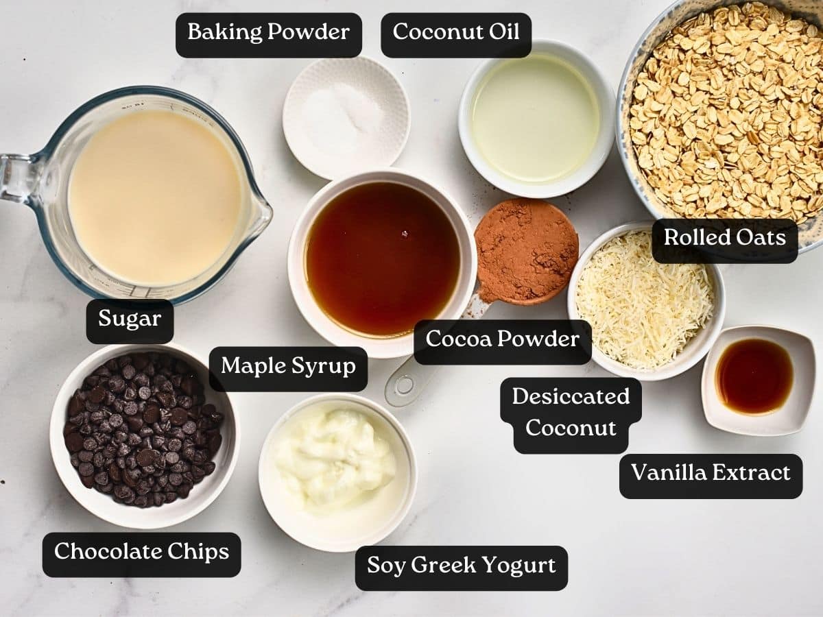 Ingredients for Brownie Baked Oatmeal in bowls and ramekins.