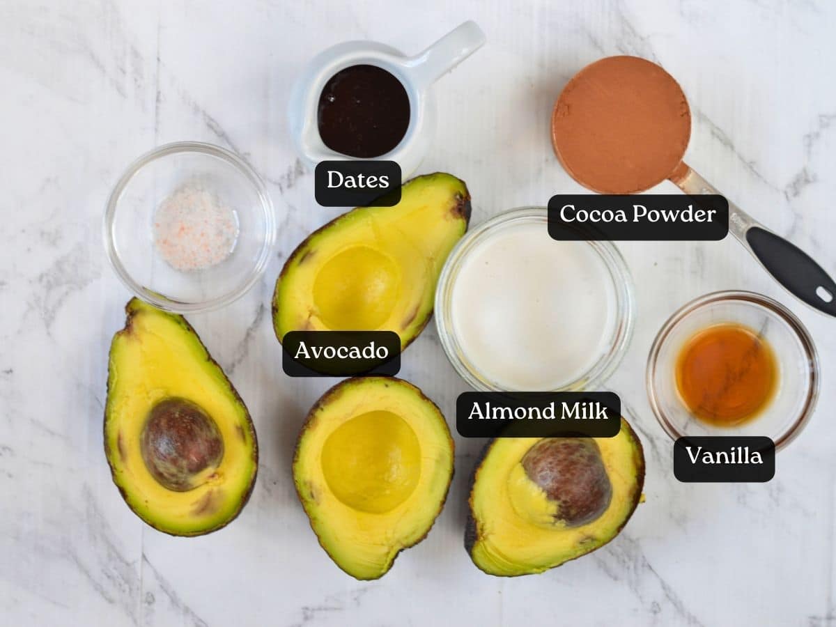 Ingredients for Chocolate Avocado Smoothie in bowls and ramekins.