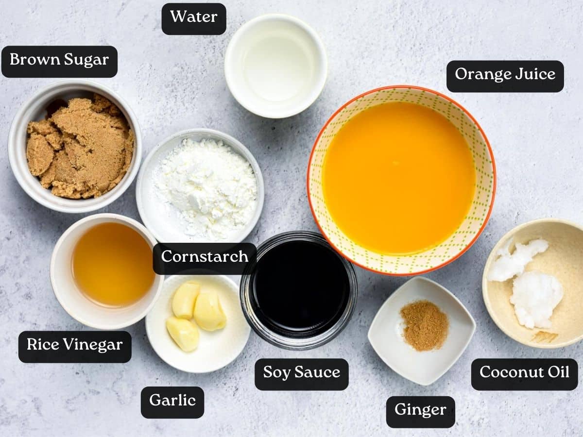Ingredients for Orange Cauliflower Sauce in bowls and ramekins.