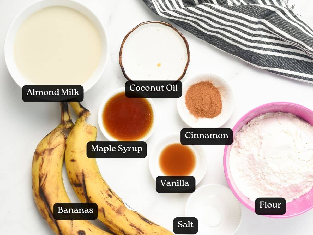Ingredients for Vegan Banana Pancakes in bowls and ramekins.