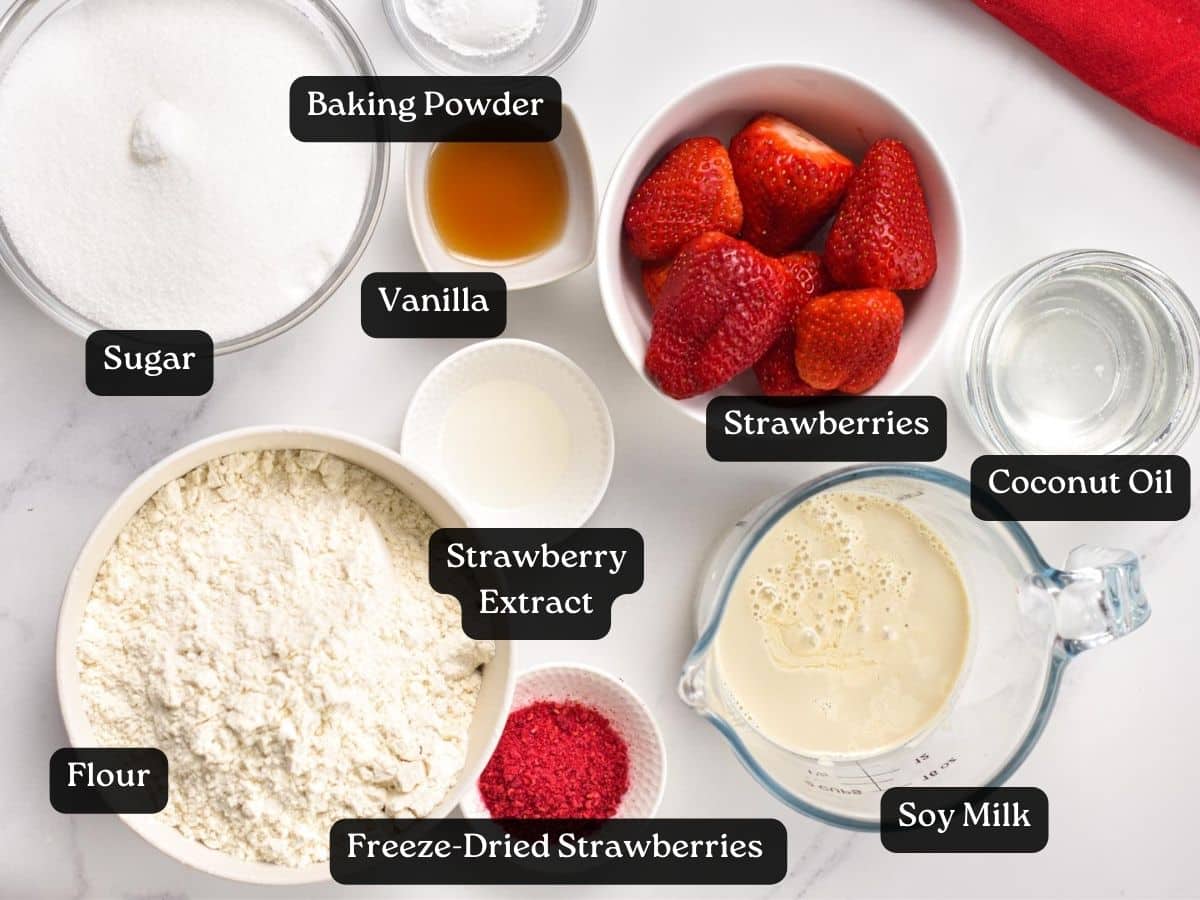 Ingredients for Vegan Strawberry Cake in bowls and ramekins.