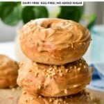 a stack of three peanut butter donuts with peanut butter glaze