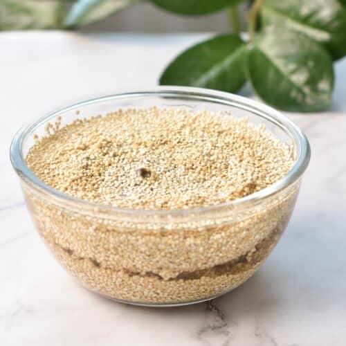 a bowl filled with quinoa and water