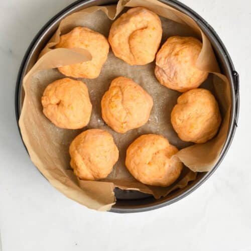 Sweet Potato Bread Rolls in a baking pan.