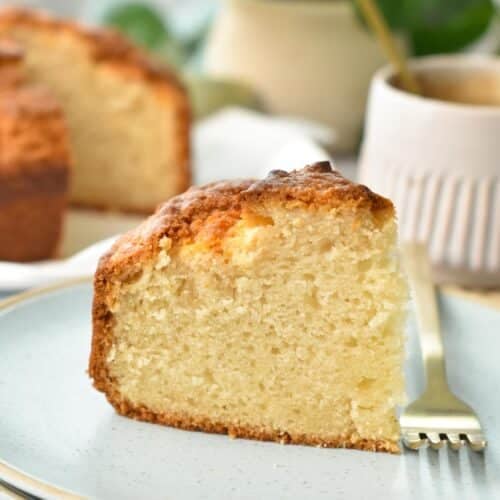 a slice of yogurt cake on a blue plate