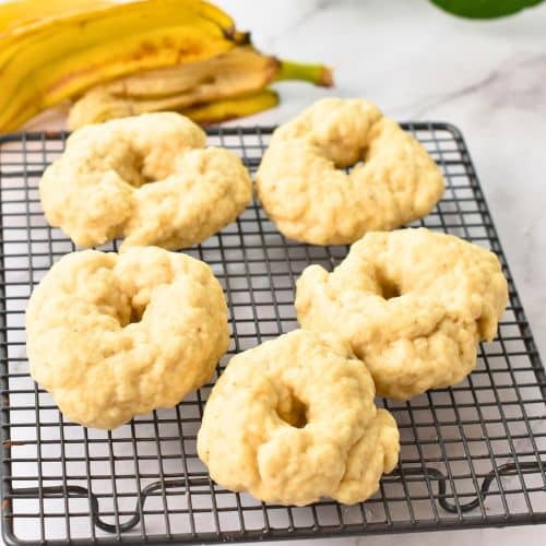Banana Bagels boiled, steaming out on a wire rack.