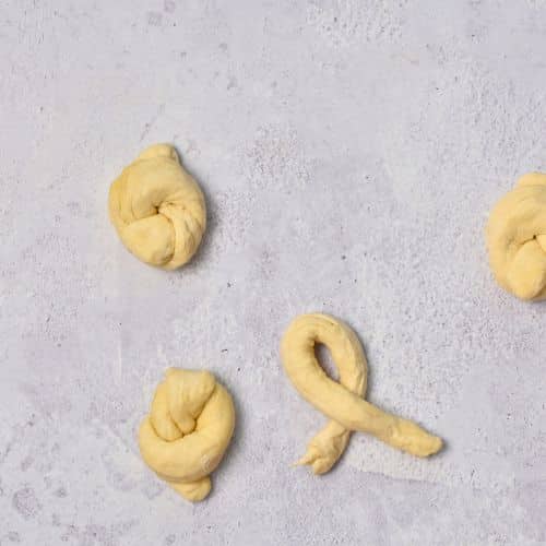 Folding garlic knot dough