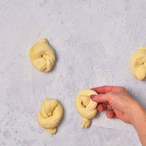 Making the knot of garlic knot.