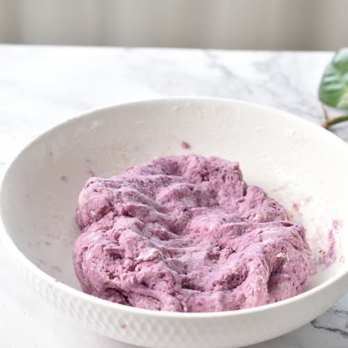 Purple sweet potato pita dough in a mixing bowl.