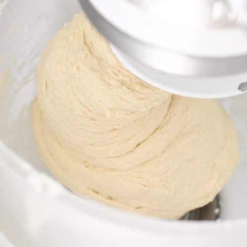Kneaded spelt pizza dough in a stand mixer.