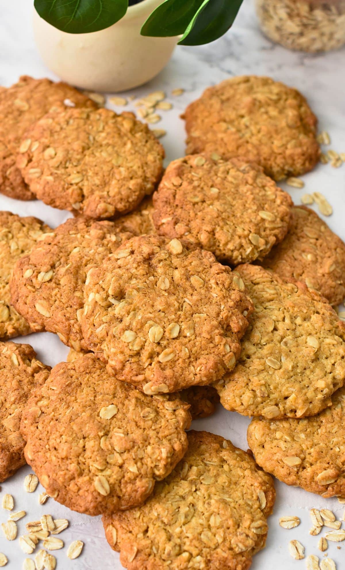 Vegan Anzac Cookies on a white table.