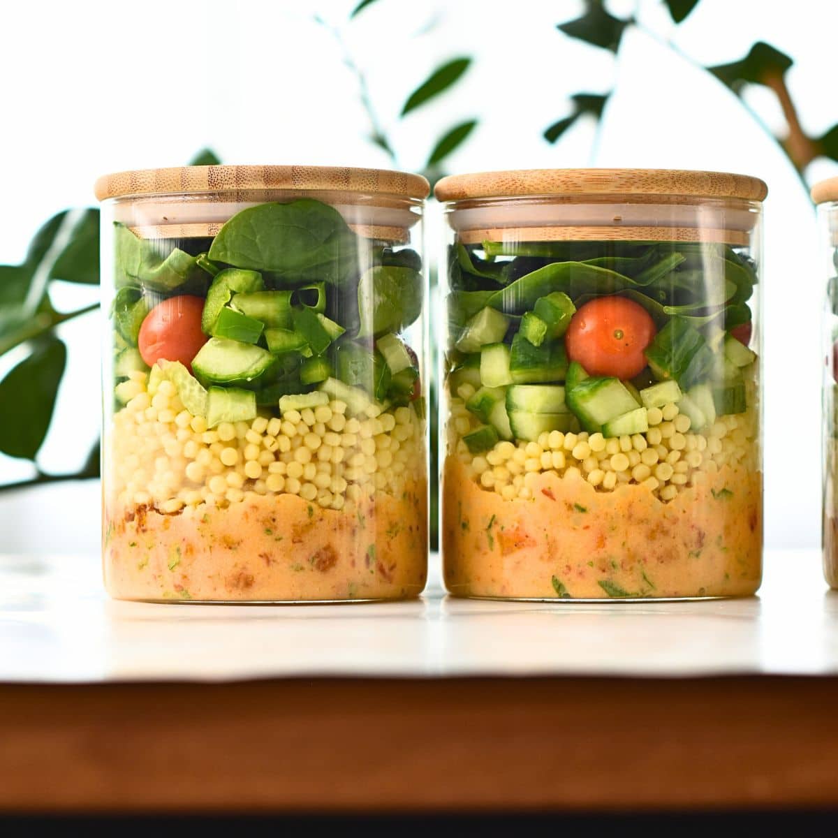 Couscous Vegan Salad in two meal prep jars.