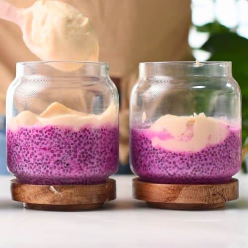 Adding the protein yogurt mixture on the Dragon Fruit Chia Pudding
