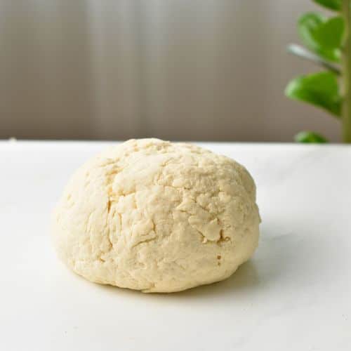 Monkey Bread Casserole dough in a large ball.