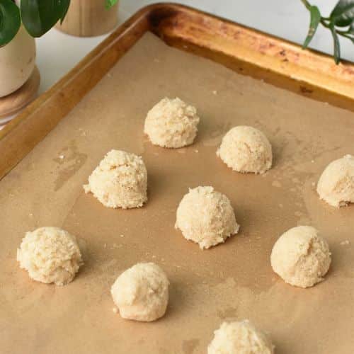 Coconut Almond Cookies formed on a baking sheet.