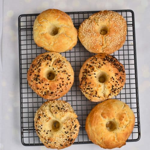 2-Ingredient Bagels cooling down on a wire rack.
