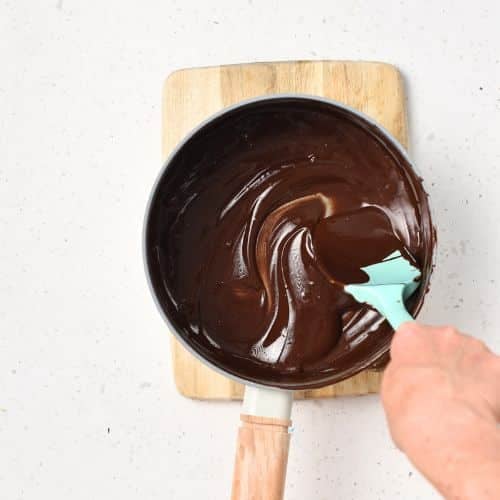 Melt the dark chocolate on a pan.