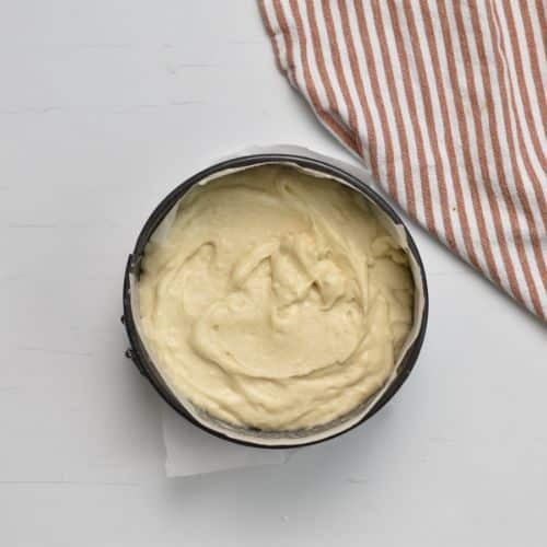 Condensed Milk Cake batter in a cake pan ready to bake.