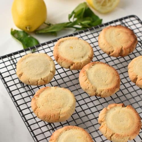 Healthy Lemon Cookies cooling down on a wire rack.