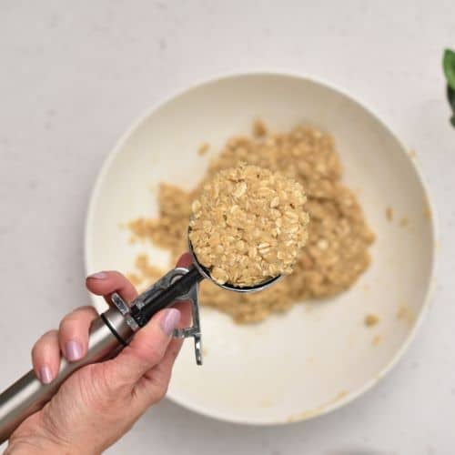 4-Ingredient Oatmeal Cookie dough scooped in an ice cream scoop.