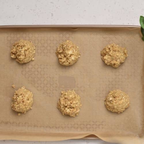 4-Ingredient Oatmeal Cookies dough balls on a baking sheet.