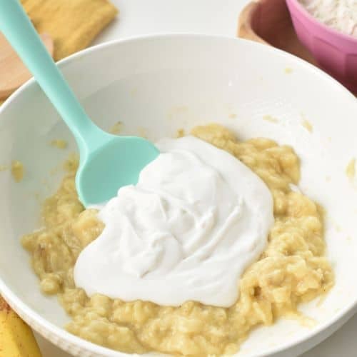 Banana Yogurt Muffin wet ingredients in a bowl.