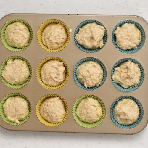 Banana Yogurt Muffins ready to bake in a muffin tin.
