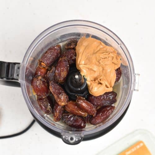 Dates and peanut butter in a food processor.