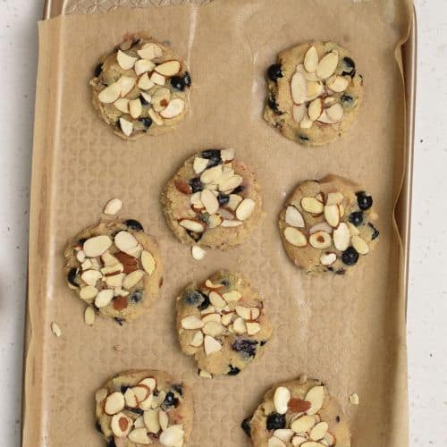 Almond Blueberry Cookie ready to bake on a baking sheet.