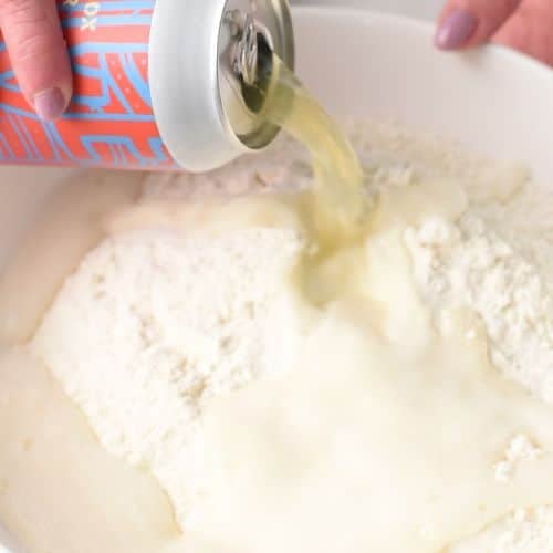 Mixing Beer Bread ingredients in a bowl.