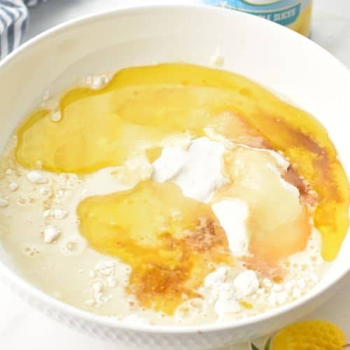 Easy Pineapple Upside Down Cake batter ingredients in a bowl,
