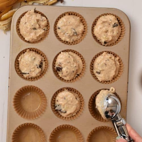 Banana Bread Chocolate Chips Muffin formed in the tin.