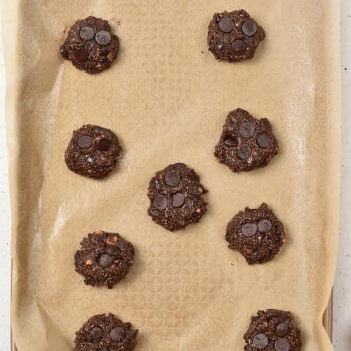 Chocolate Hazelnut Cookies ready to bake on a baking sheet.